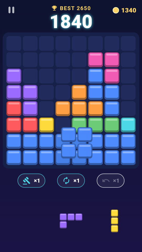 Dragging a block over the board, with the lines it will clear highlighted